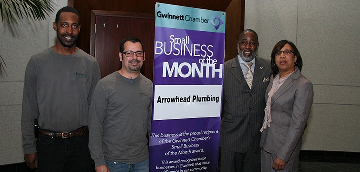 Arrowhead Plumbing accepting Gwinnett Chambers small business of the month award