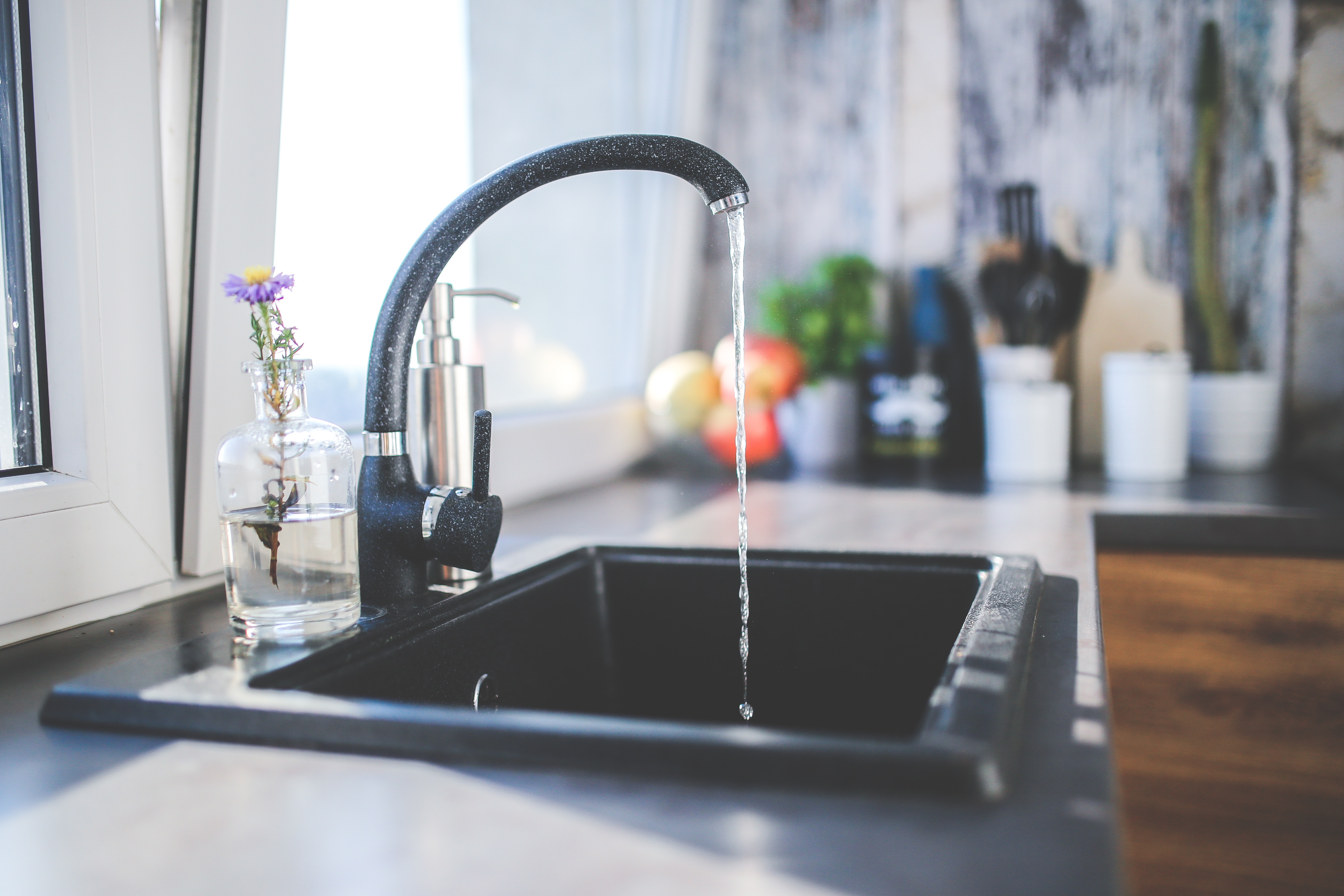 a kitchen faucet with clean water