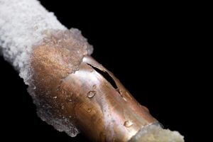 a burst copper pipe after freezing